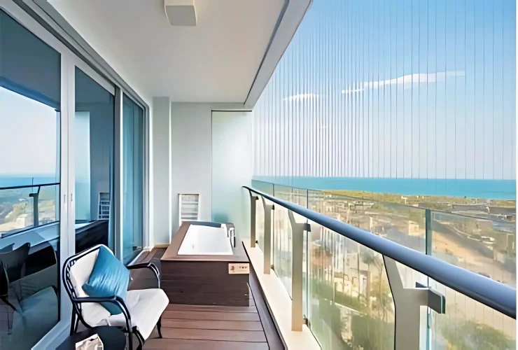 Hanging chair balcony among the towers